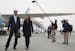 U.S. Secretary of State John Kerry walks after disembarking from his plane in Geneva, Switzerland, Sunday March 15, 2015. Kerry is in Geneva to resume