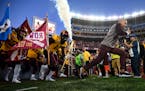 The Minnesota Gophers were led out to the field by Minnesota Gophers head coach PJ Fleck before Thursday night's game against the South Dakota State J