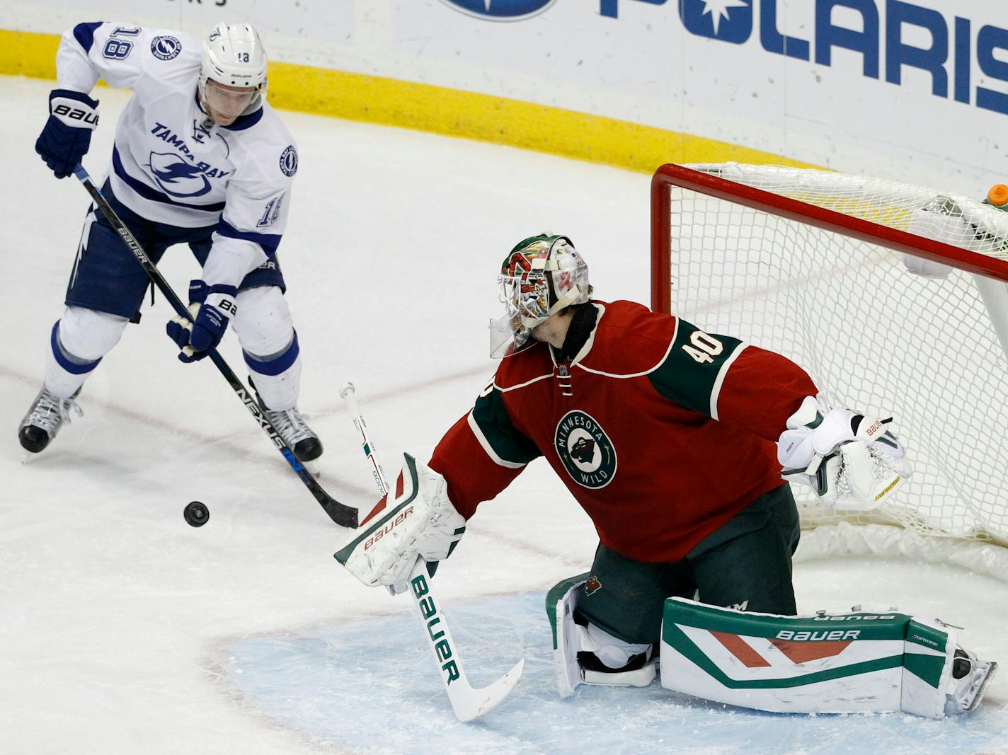 Wild goalie Devan Dubnyk deflected a shot in front of Lightning left winger Ondrej Palat during the first period Saturday.