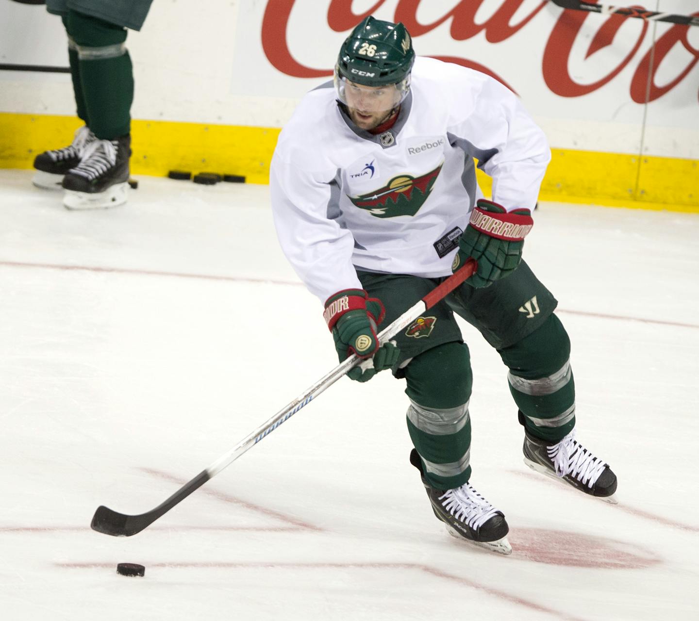 1st Day of School - The Minnesota Wild held their first day of training camp Friday at the Xcel Center in St. Paul. Here, Thomas Vanek picks up the puck in front of the net.] Brian.Peterson@startribune.com St. Paul, MN - 9/18/2015