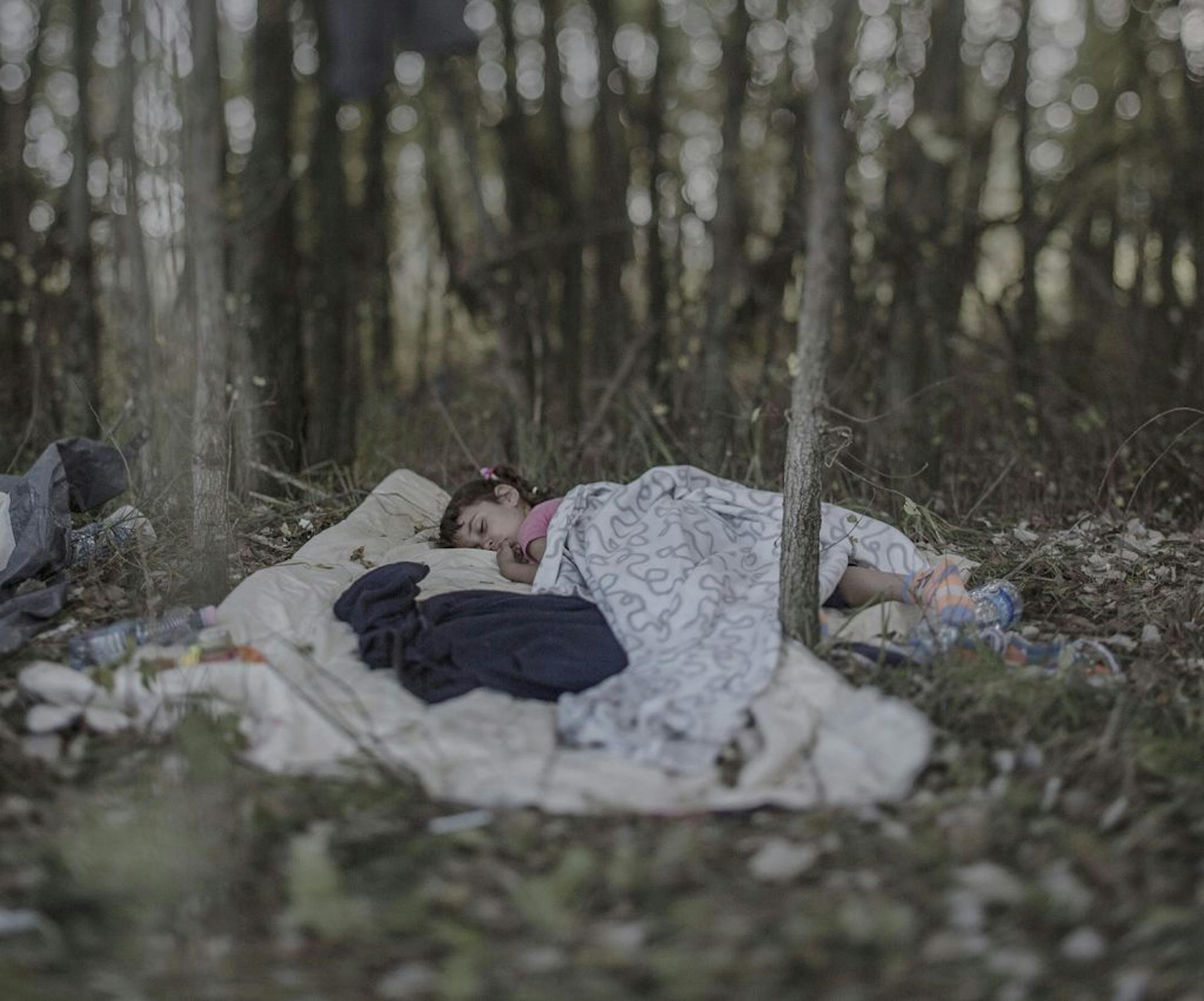A boy without a bed. A girl afraid to close her eyes. A child who dreams of when bedtime didn�t bring terror. More than two million children have been forced from their homes by the war in Syria. Refugee children in neighbouring countries or making journeys through Europe show us where they sleep while they await an uncertain future. Magnus Wennman, winner of two World Press Photo Awards, has partnered with UNHCR to raise awareness about refugee children. ��� Lamar, 5 Horgos, Serbia Lamar left h