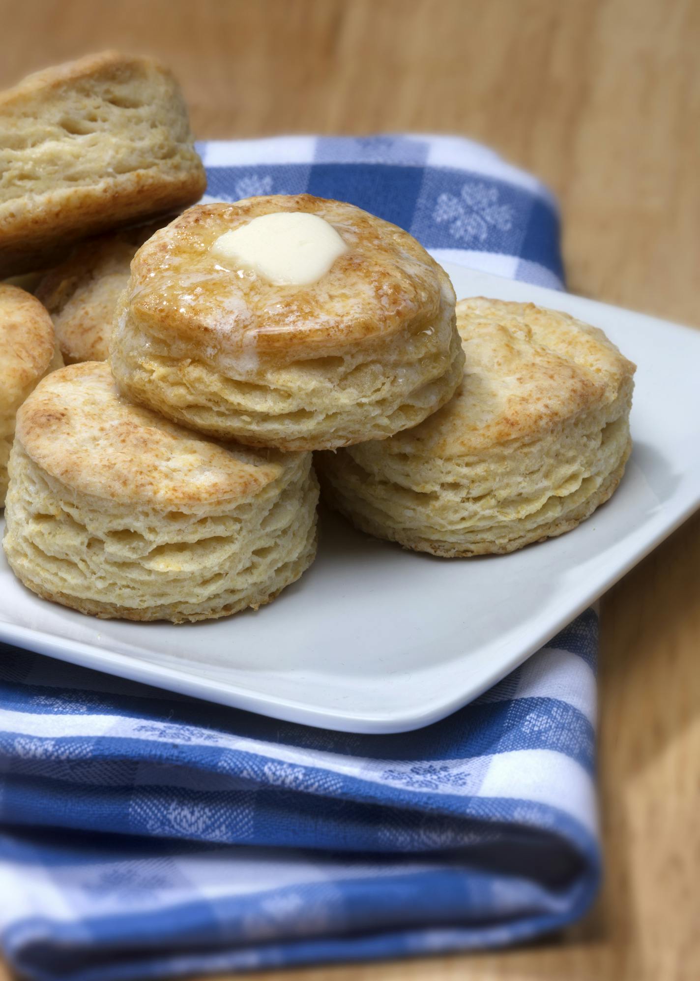 The buttermilk in these biscuits serves as the acid necessary to activate the baking soda in the ingredients. The liquid also adds extra flavor and helps the biscuits brown.