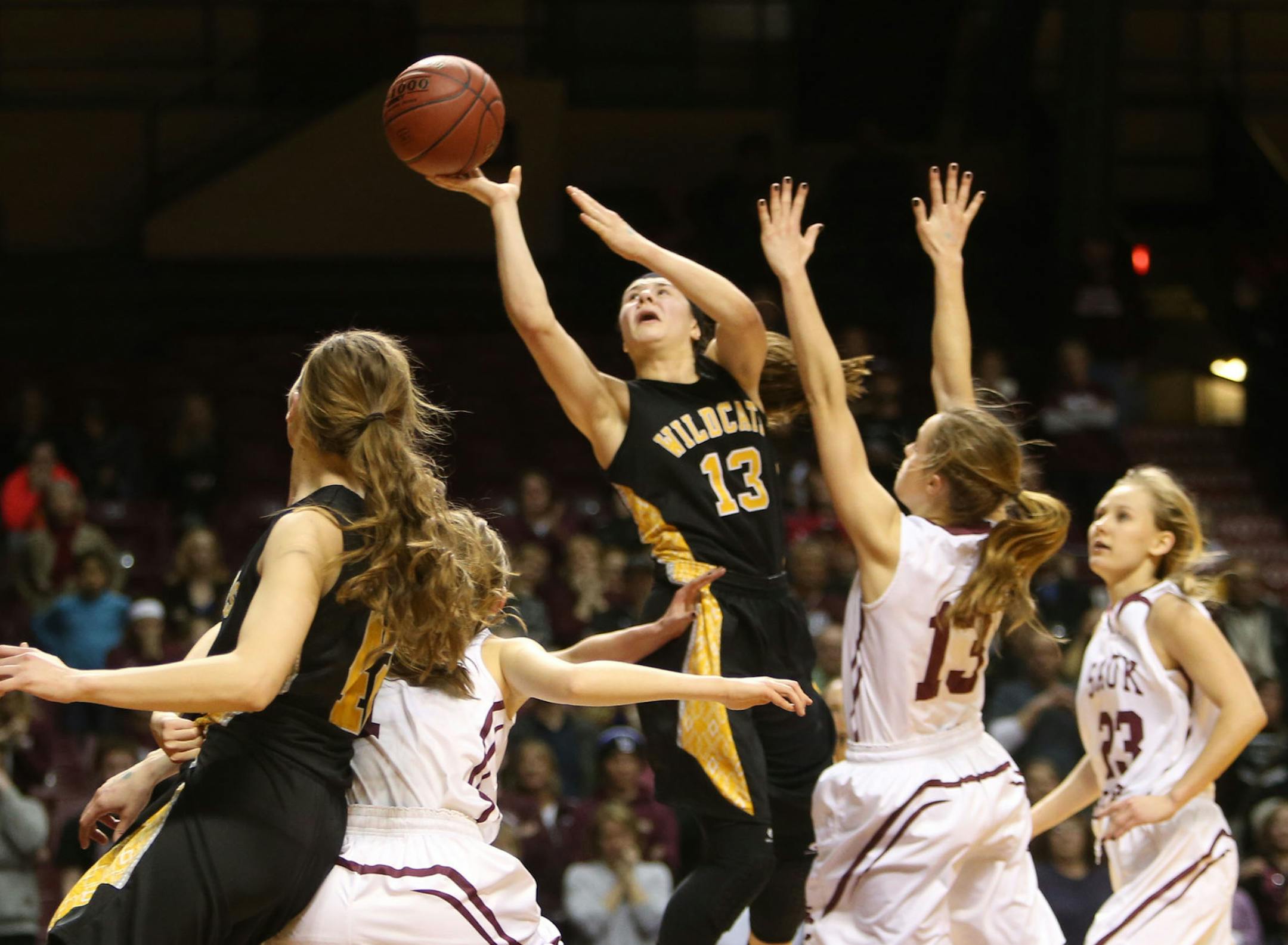 New London-Spicer 's Shea Oman (13) hits the game winner giving her team a 49-46 win over Sauk Centre during the girls' 2A semifinals Friday, march 18, 2016, at Williams Arena in Minneapolis, MN.](DAVID JOLES/STARTRIBUNE)djoles@startribune.com Class 2A semifinals, 6 and 8 p.m., Williams Arena. What's Happening at this time: game action, Class 2A girls' basketball semifinals, 6 and 8 p.m. First game:Plainview-Elgin-Millville ††vs.†† Roseau Second game: Sauk Centre 