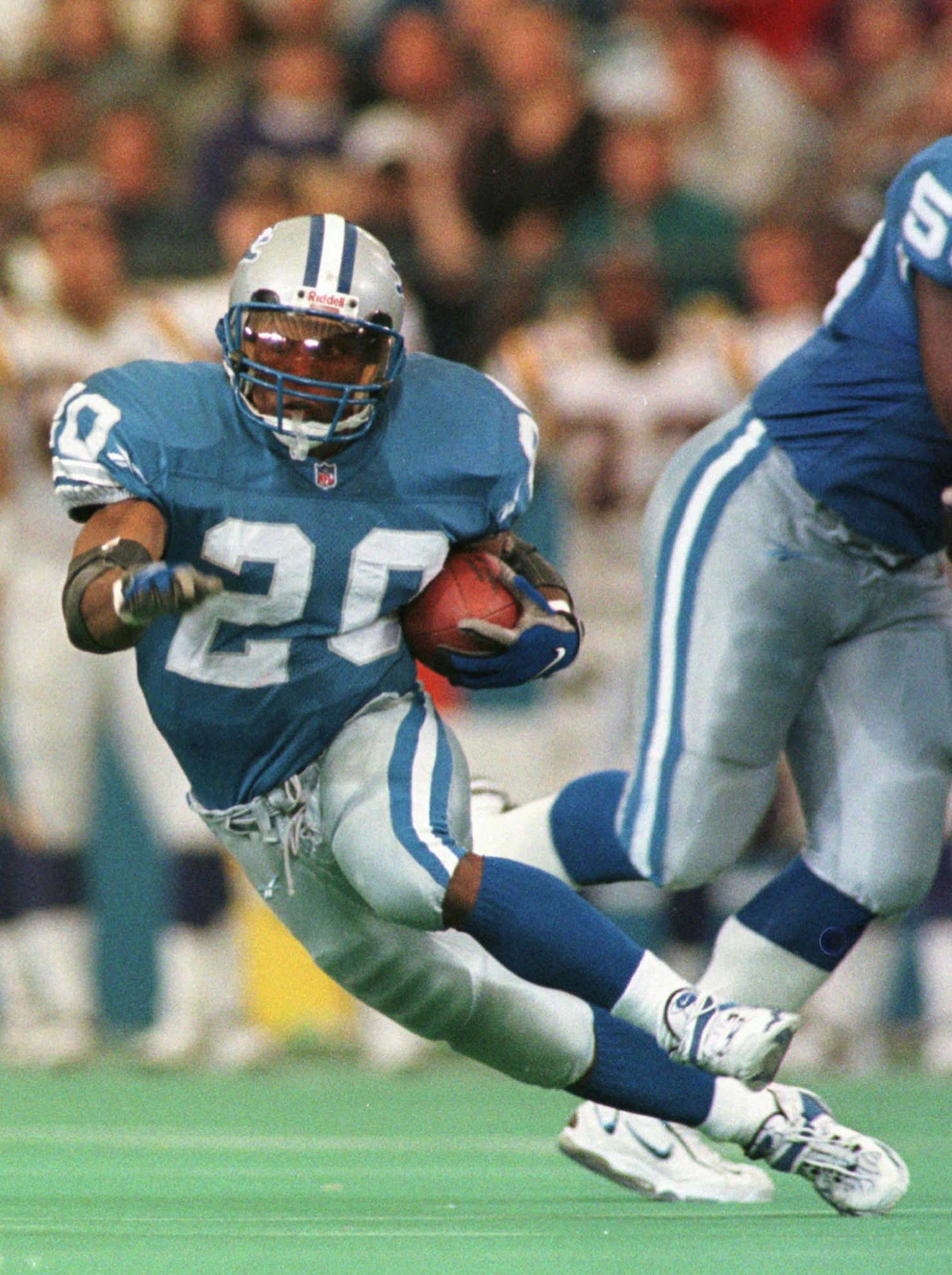 Detroit Lions running back Barry Sanders (20) looks for running room against the Minnesota Vikings during the second quarter at the Silverdome in Pontiac, Mich., Sunday, Nov. 16, 1997. (AP Photo/Duane Burleson) ORG XMIT: POS103