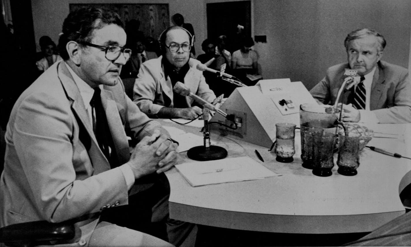 In this 1982 photo, former Minnesota Governor Rudy Perpich, left, answered a panelist's question as he faced fellow DFL candidate for Governor, Warren Spannaus, right, on a WCCO radio debate with host Dick Chapman, center. Spannaus died suddenly at the hospital Monday.