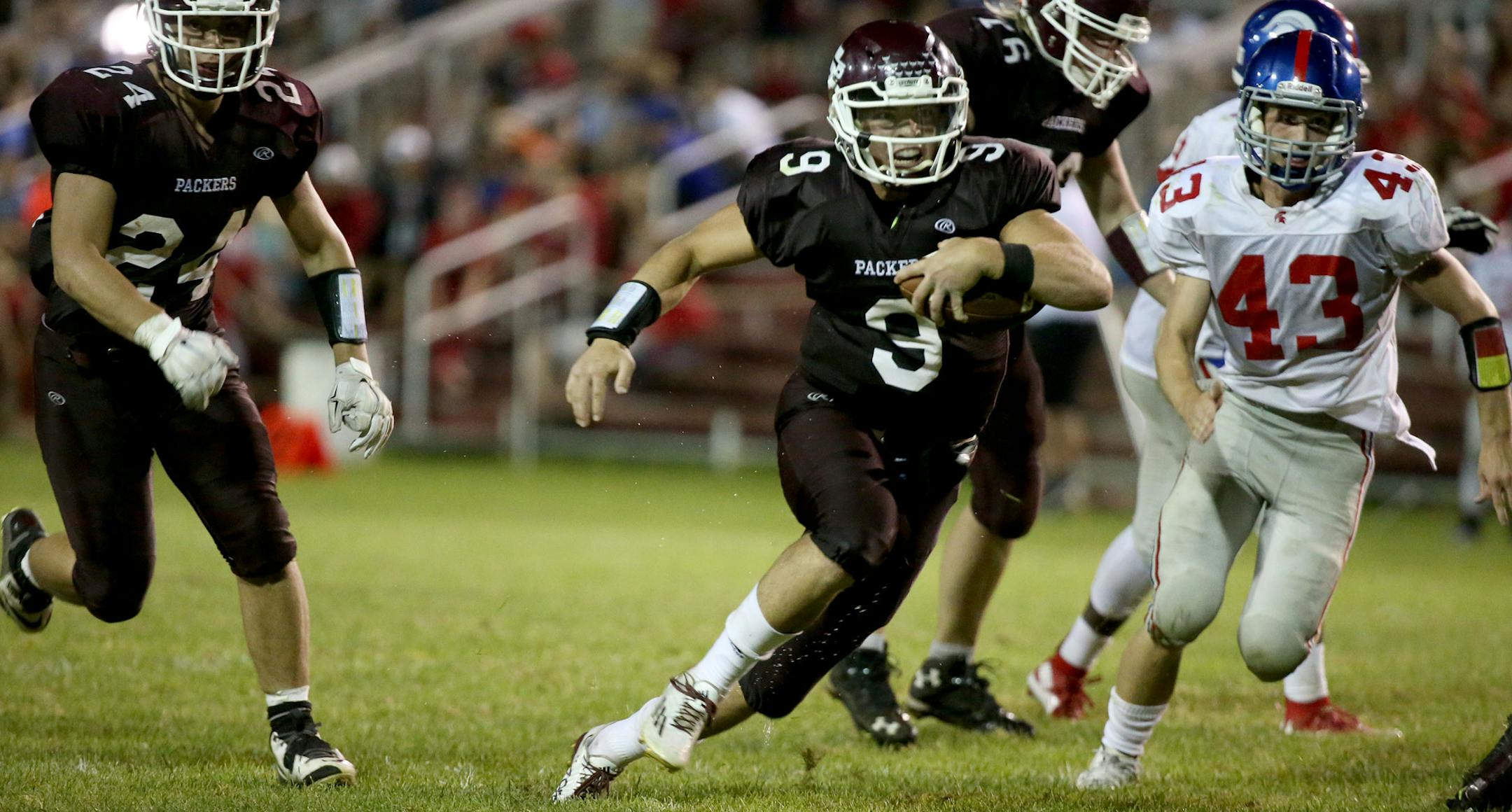 South St. Paul's quarterback Daniel Pietruszewski ran in for his team's fifth touchdown of the game during the second half. ] (KYNDELL HARKNESS/STAR TRIBUNE) kyndell.harkness@startribune.com Simley vs South St. Paul in South St. Paul, Min., Friday September 4, 2015. South St. Paul won over Simley 35-20