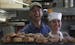 Eva and Fari Sabet, owners of the Swedish Crown Bakery, stood behind the counter at Grass Roots Co-op in Anoka, Min., Wednesday, May 15, 2013. The Swe