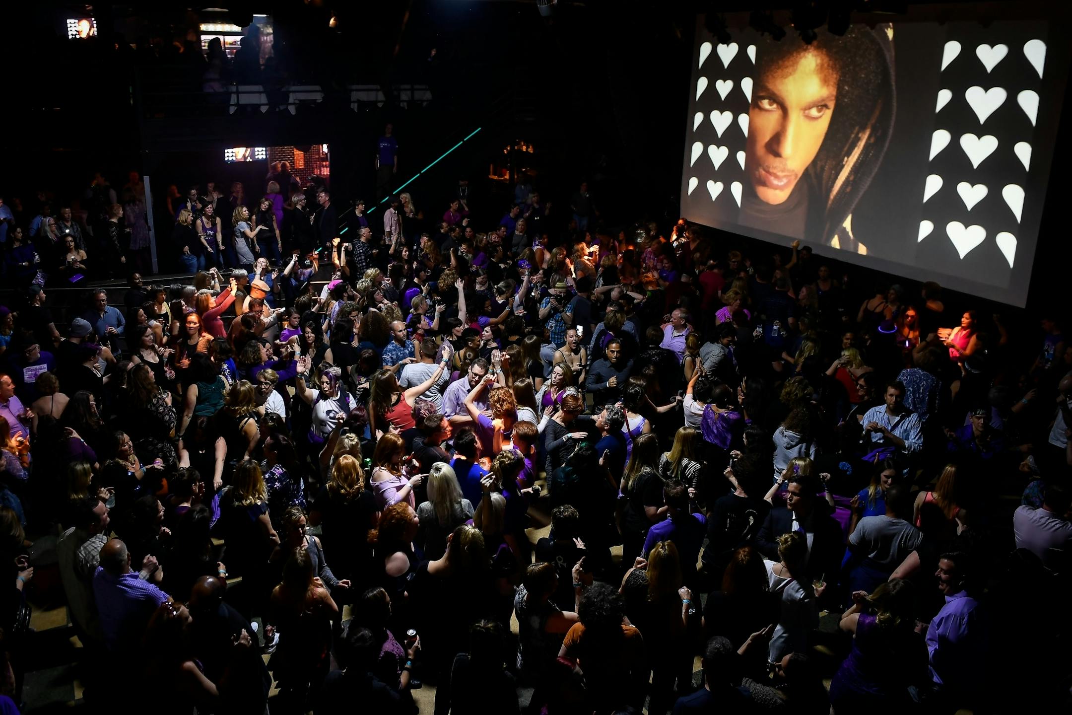 Revelers danced at First Avenue's all-night dance party honoring Prince Friday night.