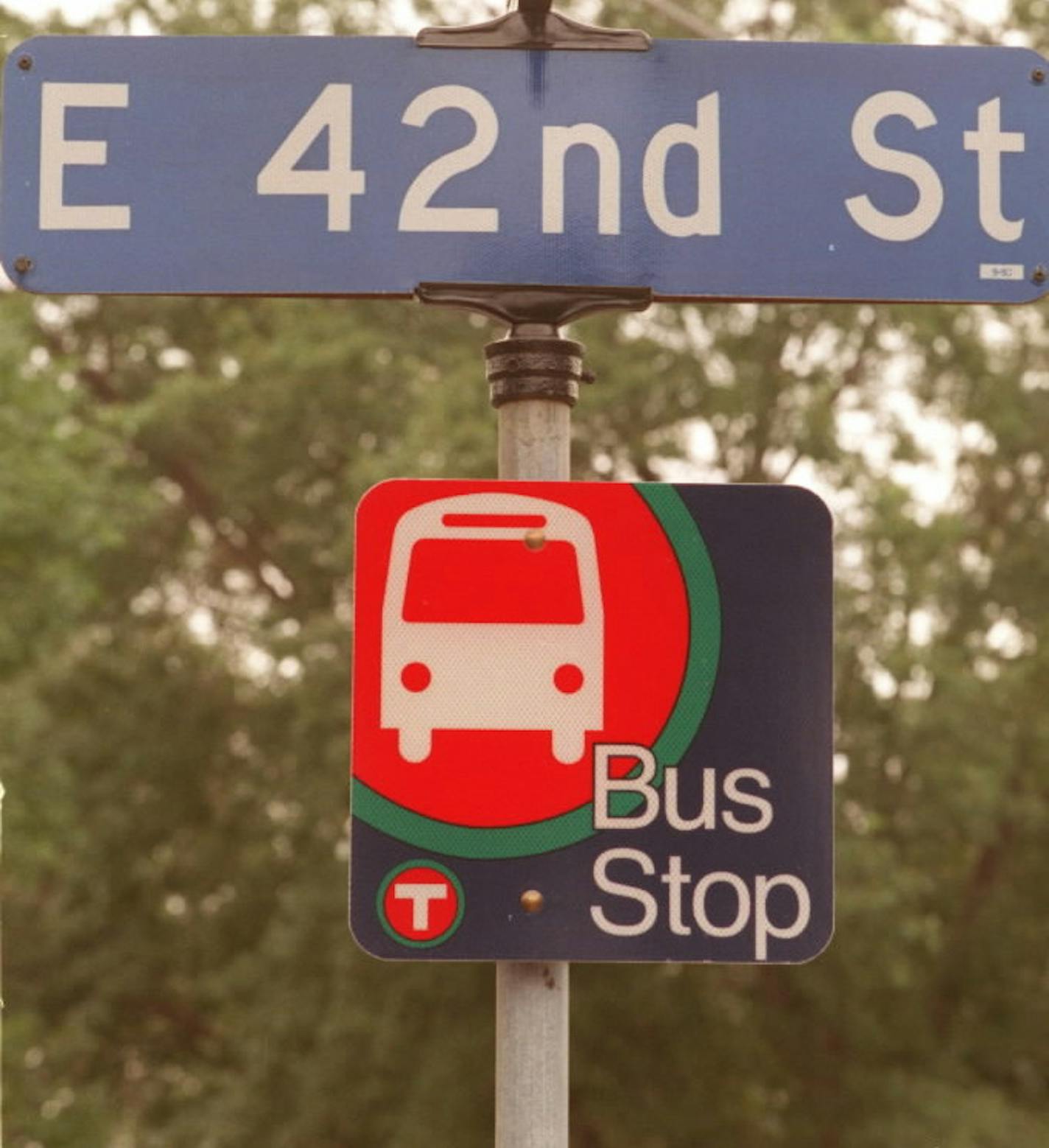 1B RAIL for Aug 20 - New bus stop sign adorns the street sign at 42nd and Chicago in Minneapolis.