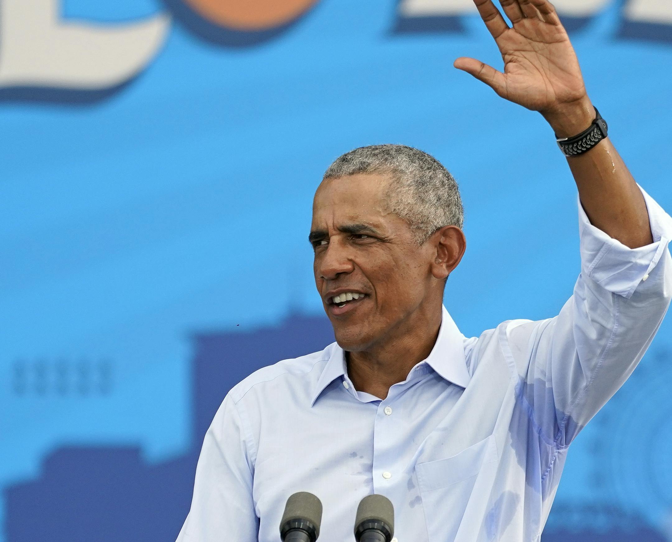 Former President Barack Obama waves to supporters as he leaves a rally while campaigning for Democratic presidential candidate former Vice President Joe Biden Tuesday, Oct. 27, 2020, in Orlando, Fla. (AP Photo/John Raoux)