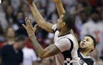 Rockets forward Trevor Ariza drove past Spurs guard Kyle Anderson during the second half in Game 4 of an NBA second-round playoff series Sunday. Houst