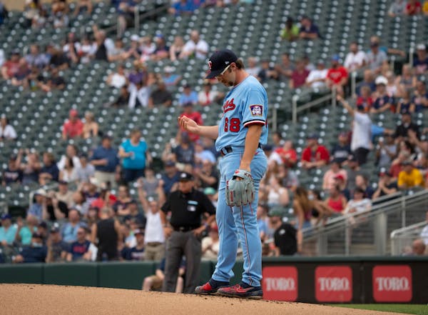Minnesota Twins starting pitcher Randy Dobnak (68) pondered on the mound after giving up a solo home run to New York Yankees right fielder Aaron Judge