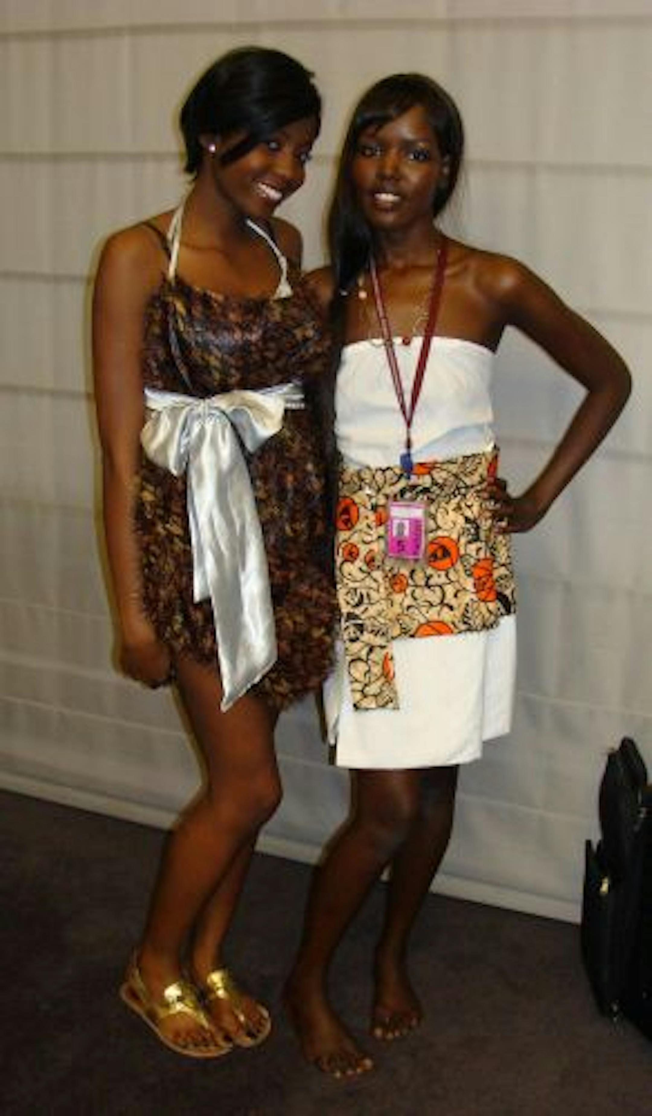 Model Sada Ngoshani in a dress by Bothdol with the designer Nyamal Dol.