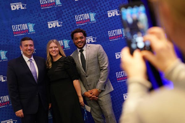 Corey Day, right, then executive director of the DFL Party, with DFL Chairman Ken Martin and staffer Heidi Kraus Kaplan on election night in 2018.
