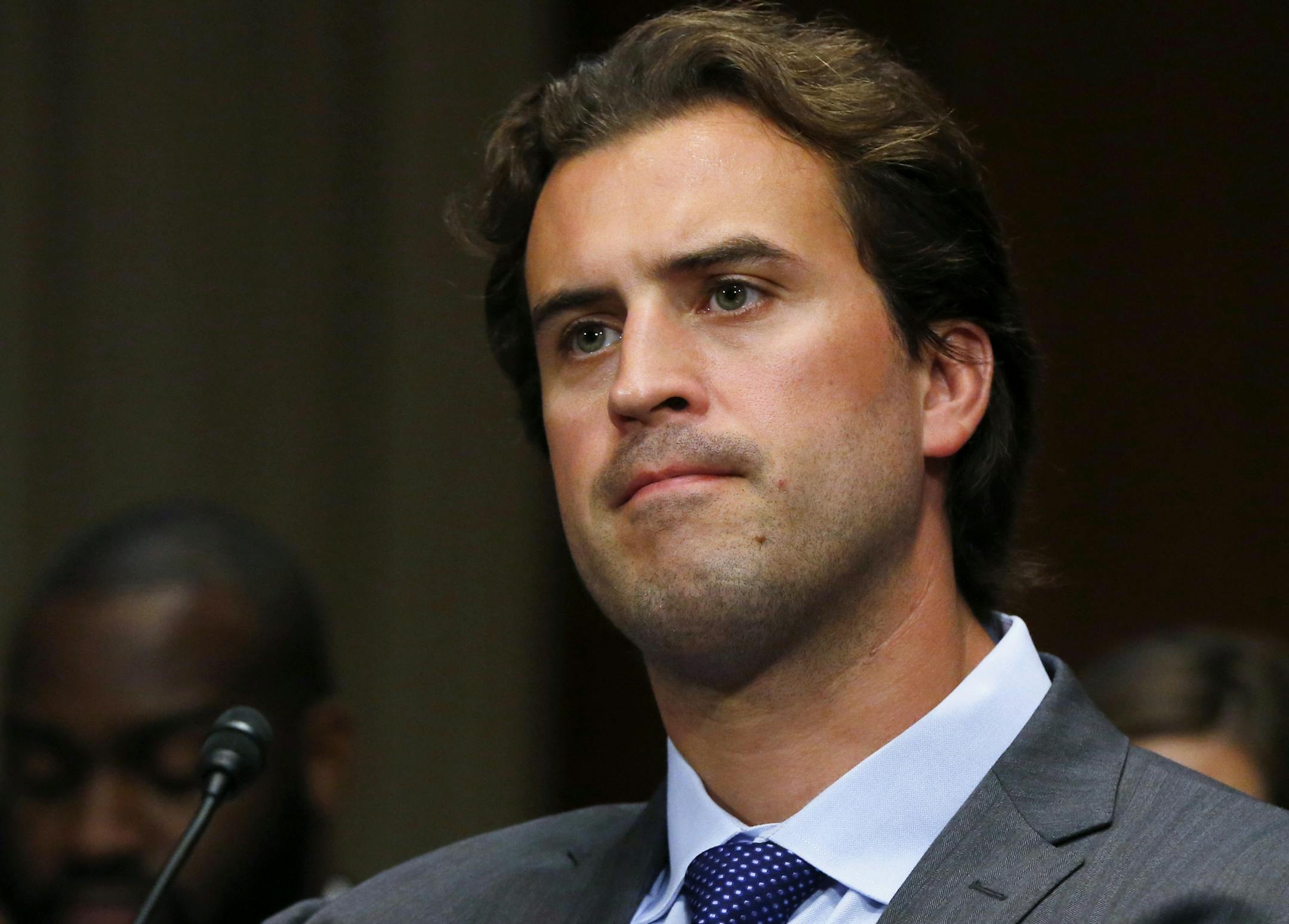 Former professional athlete Ben Utecht, a Super Bowl-winning tight end for the Indianapolis Colts, testifies on Capitol Hill in Washington, Wednesday, June 25, 2014, before the Senate Special Committee on Aging hearing regarding concussions and the long term effects of brain related sports injuries. (AP Photo/Charles Dharapak) ORG XMIT: MIN2014062618474189