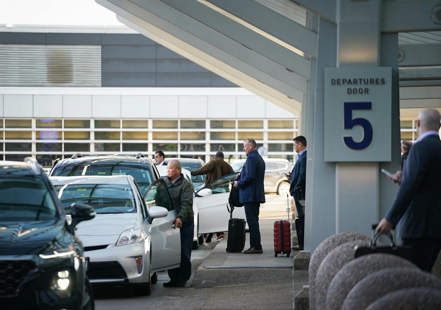 Airport traffic was steady and moving quickly through security at the start of MEA weekend at Minneapolis International Airport Terminal 1 on Wednesday morning, October 16, 2019. In this photos, vehicles operating as share riding service line up to pick up passengers.
Shari L. Gross • shari.gross@startribune.com