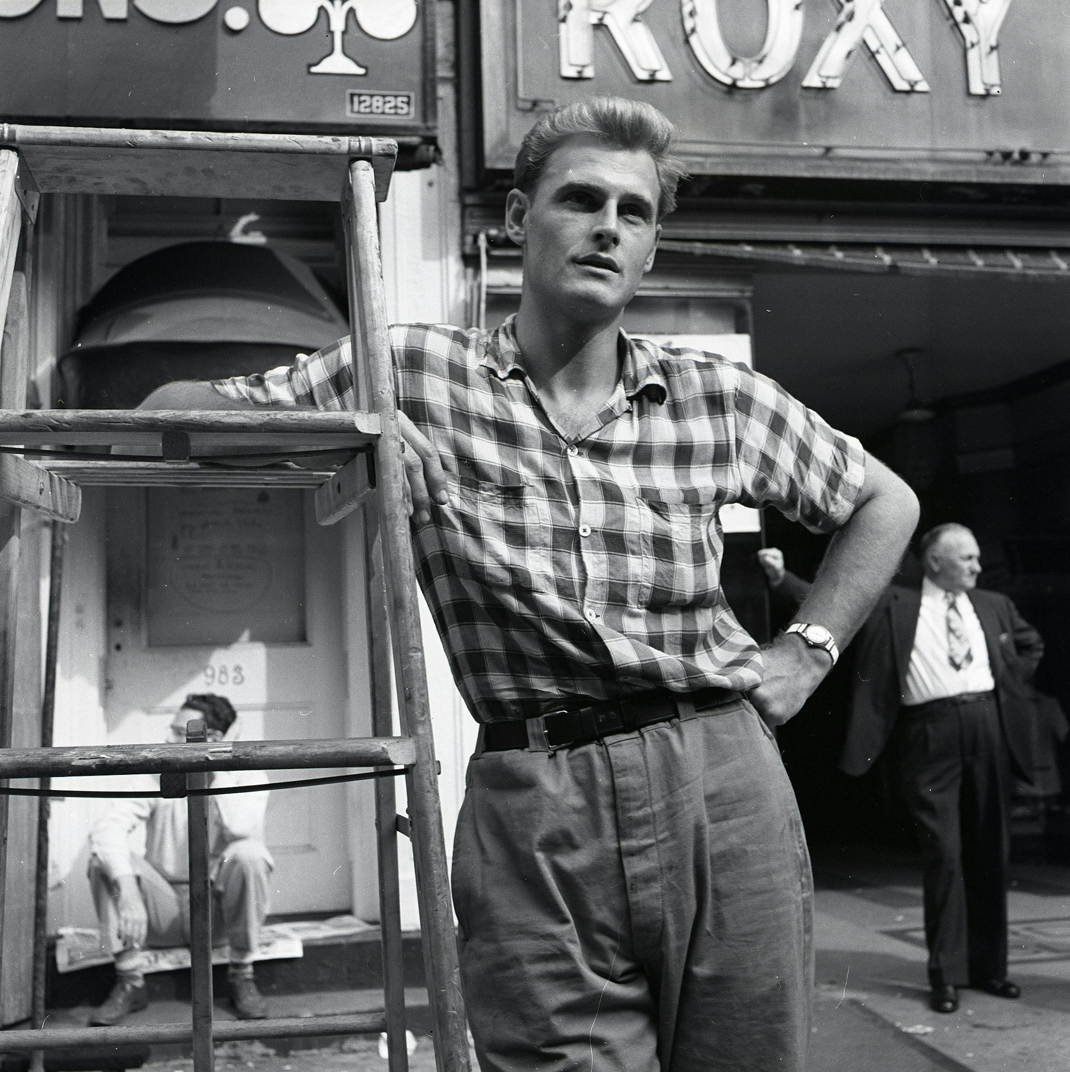 Vivian Maier photo, "Man Leaning on Ladder."