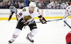 Chicago Blackhawks' Tomas Fleischmann, of the Czech Republic, plays against the Columbus Blue Jackets during an NHL hockey game Saturday, April 9, 201