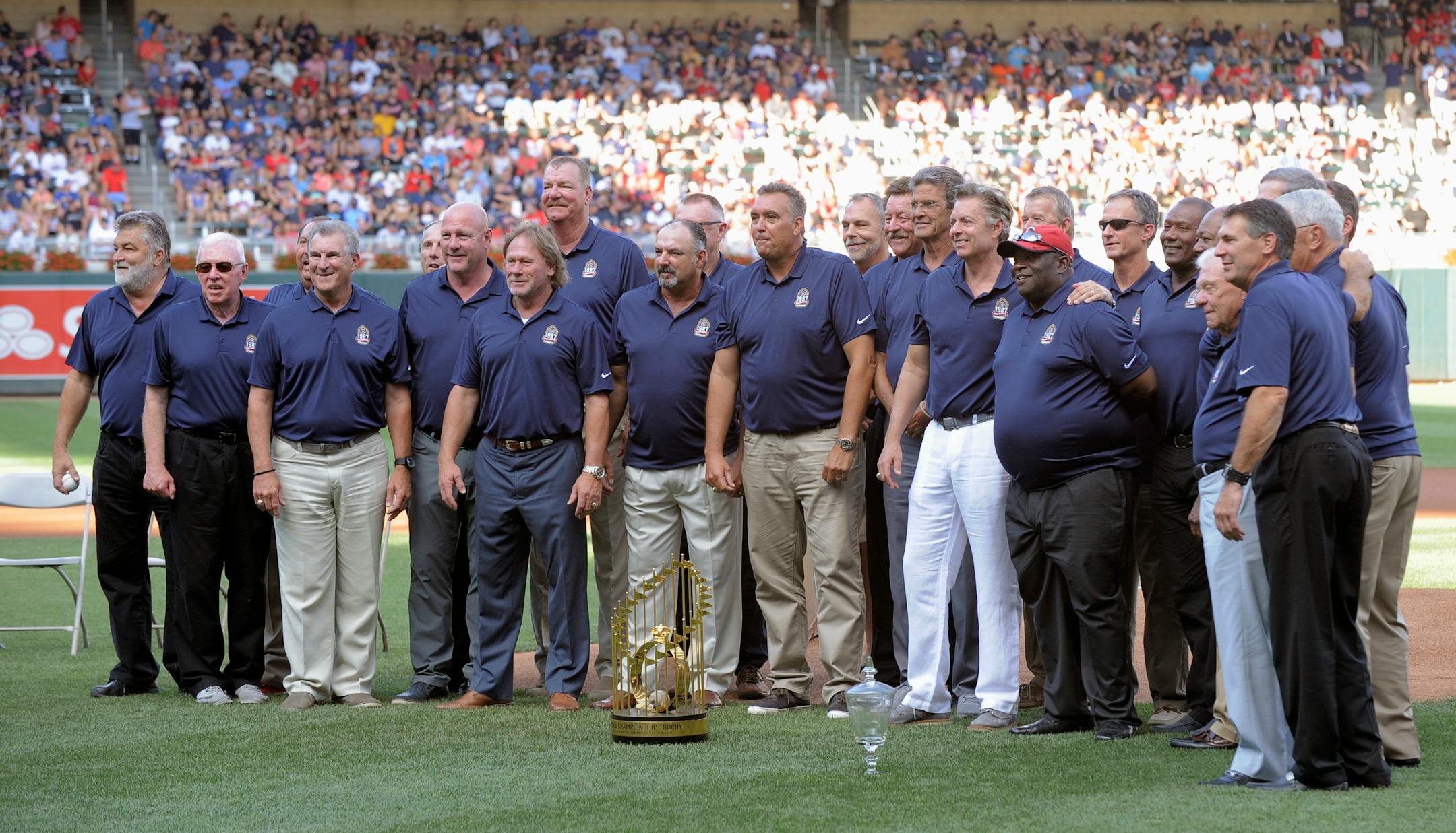 The 1987 World Series champion Minnesota Twins are honored before the Twins' baseball game against the Detroit Tigers on Saturday, July 22, 2017, in Minneapolis. (AP Photo/Tom Olmscheid)