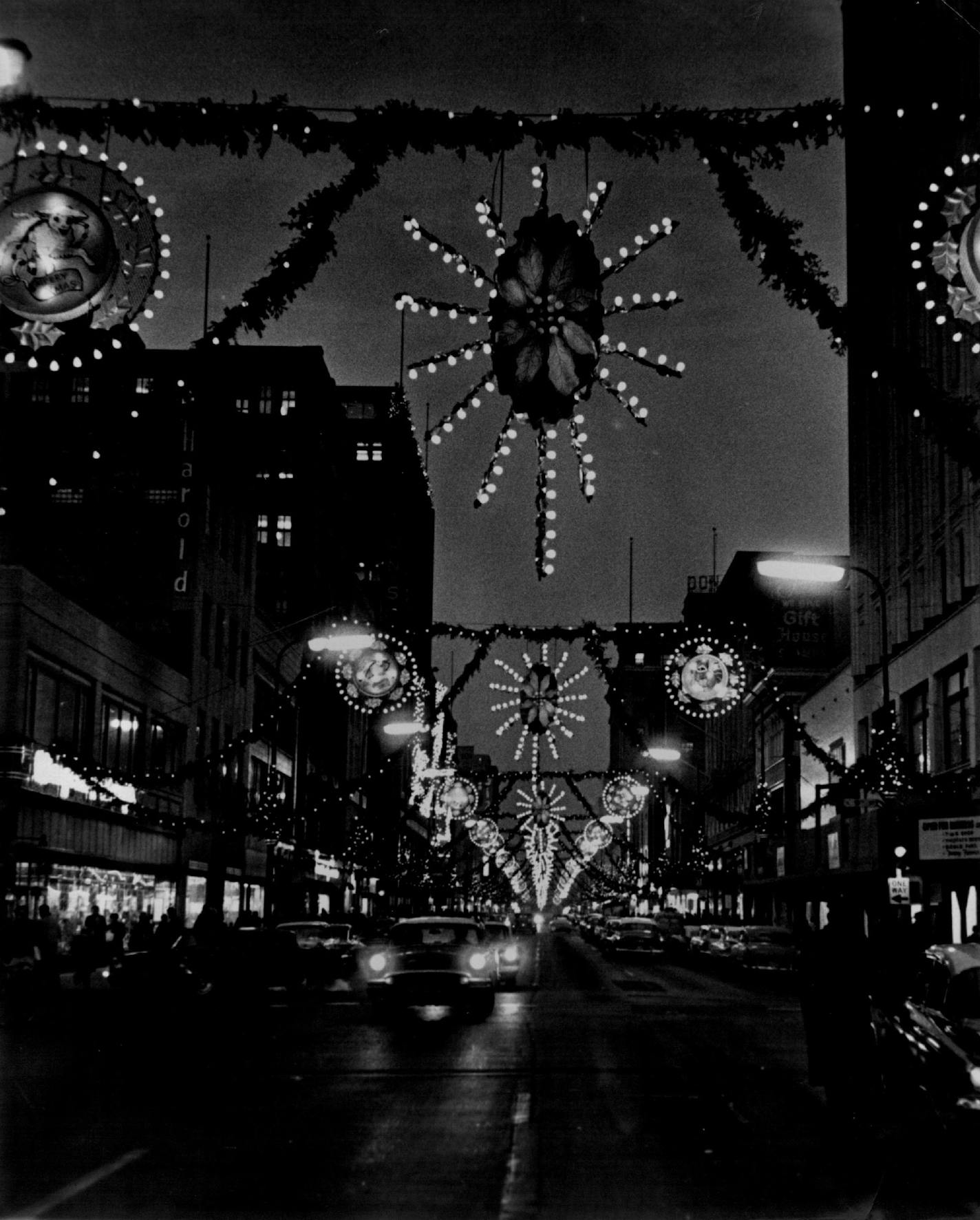 November 26, 1959 Holiday Lights Nicollet avenue twinkled with holiday atmosphere Wednesday evening when Miss Downtown, Helen Donnay, threw the switch turning on Christmas decorations. Yesterday's bright lights previewed "Light-Up Nights" sponsored annually by the Downtown council, which will begin at 5:30 p.m. Friday as stores and offices turn on all lights until 9:30. At 9 p.m., Fire Chief Reynold Malmquist will light a fireworks display atop the First National bank building. Holiday music from the Northwestern bank chimes will accompany the fireworks. The council will award $200 in prizes for the best amateur photos of the light-up. Contest photos should be sent to Leigh, Inc., 123 S. 7th St., by Dec. 9 Winners will be announced Dec. 11. November 25, 1959 Marty Nordstrom,Minneapolis Star Tribune