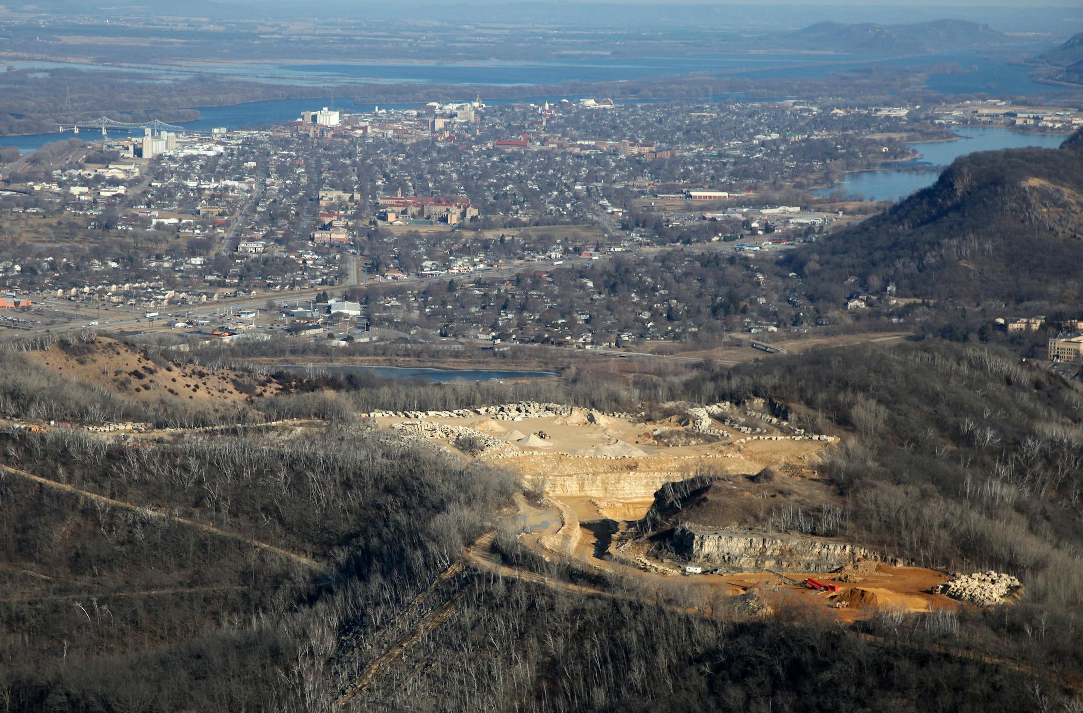 Nowhere are the concerns about sand mining, and expectations for its economic potential, more palpable than in the town of Winona. It‚Äôs also becoming a lesson in how communities cope with a new industry that is booming in lock step with the business it supplies ‚Äì the controversial oil and gas drilling practice called hydro fracking. (IN THIS PHOTO) Aerial views of the Biesanz Stone Company and the frac sand mining opperation. ] BRIAN PETERSON ‚Ä&