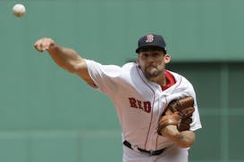 Boston Red Sox's Nathan Eovaldi delivers a pitch in the first inning of a baseball game against the Minnesota Twins, Sunday, July 29, 2018, in Boston.