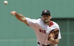 Boston Red Sox's Nathan Eovaldi delivers a pitch in the first inning of a baseball game against the Minnesota Twins, Sunday, July 29, 2018, in Boston.