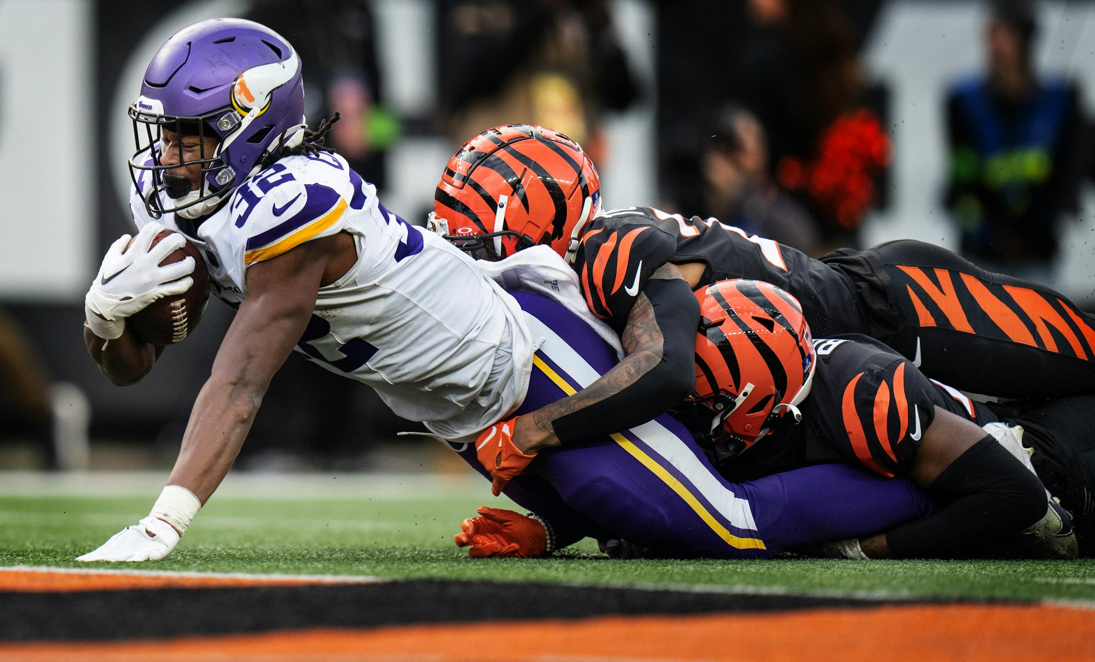 Minnesota Vikings running back Ty Chandler (32) picked up a first down in the fourth quarter taking the ball to the one yard line Saturday December ,16 ,2023 in,Cincinnati, OH. ] JERRY HOLT • jerry.holt@startribune.com