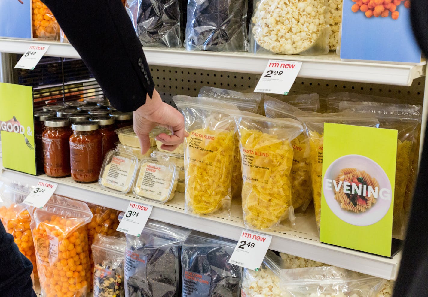 Target Executive Greg Shewmaker points out the new labels displaying the inrediants of the food on the front packing on shelves at the Edina Target off of York Ave, Friday afternoon. ] Elizabeth Brumley special to the Star Tribune * Target is toying around with some new food ideas at its lab in Boston. Executives tested out and demonstrate some of those ideas at the Edina store on Friday.