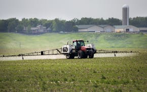 Farmers apply fertilizer to their fields south of Edgerton.