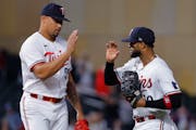 Twins relief pitcher Jhoan Duran, left, and center fielder Willi Castro celebrated the team’s 3-2 victory over the Tampa Bay Rays on Tuesday at Targ