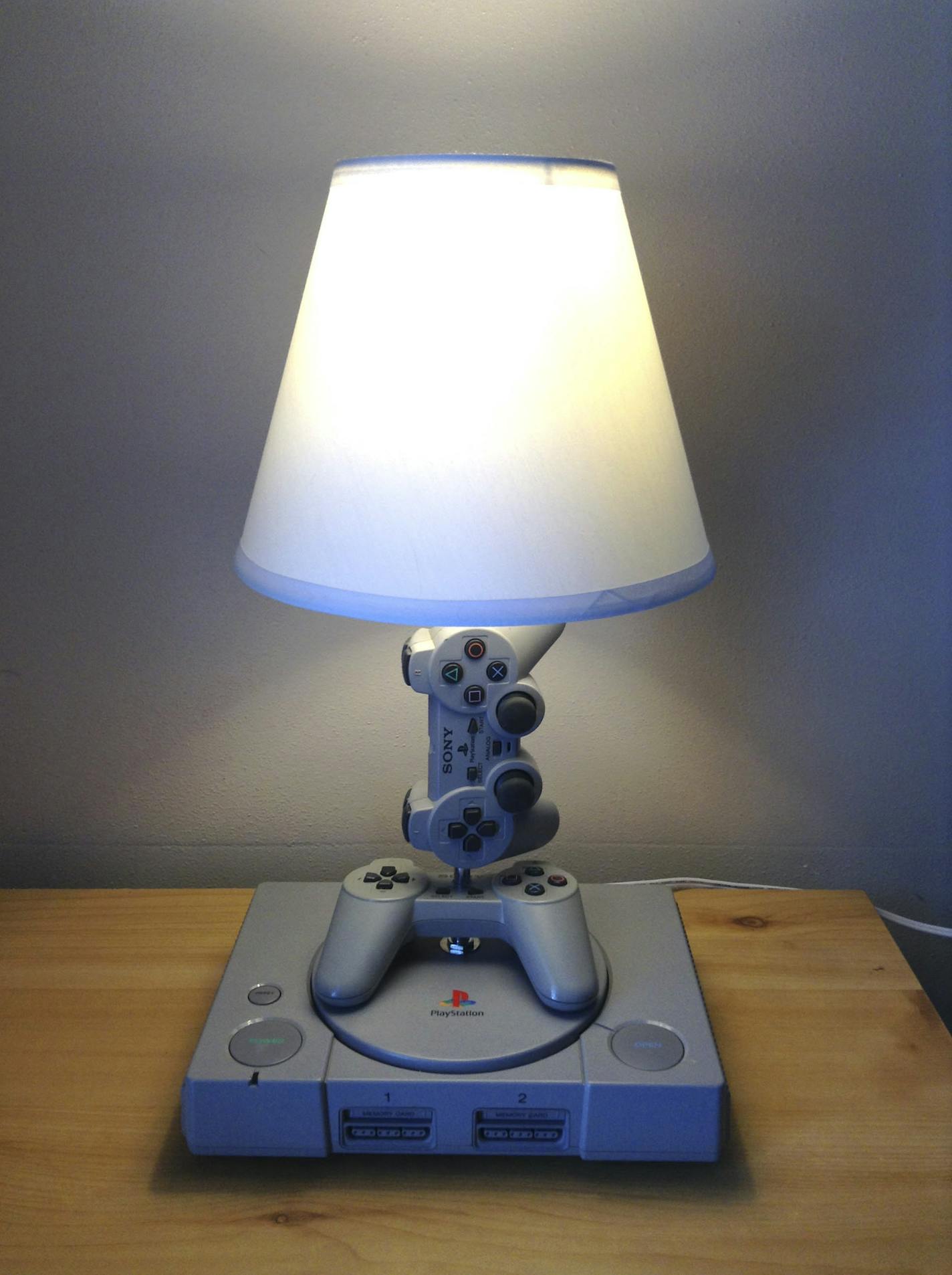 An undated handout photo of a lamp made out of an old Nintendo console and controllers by Woody6Switch Geekery.