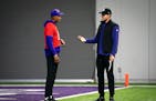 Vikings coach Kevin O’Connell, right, had time to introduce himself to Joshua Dobbs, left, but not much more than that, at practice last Wednesday.