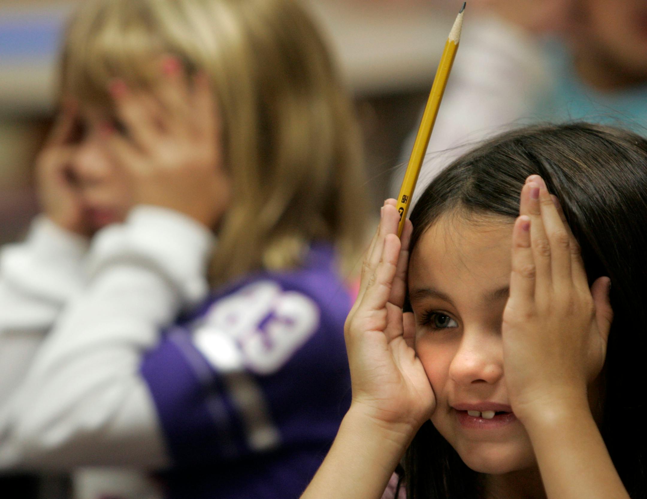 First grader Taylar (cq) Dye pretended to have the sight of an owl during class.�The Rosemount-Apple Valley-Eagan school district is running a new program in all its elementary schools this fall that aims to find gifted students who wouldn�t necessarily be identified as gifted by traditional measures.