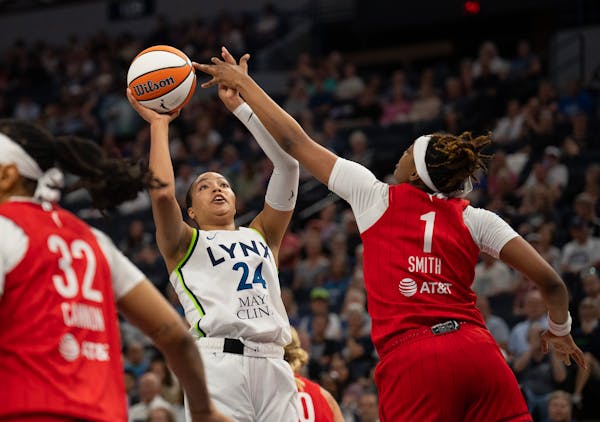 Lynx forward Napheesa Collier was fouled by Indiana forward NaLyssa Smith while shooting in a July 5 game at Target Center.