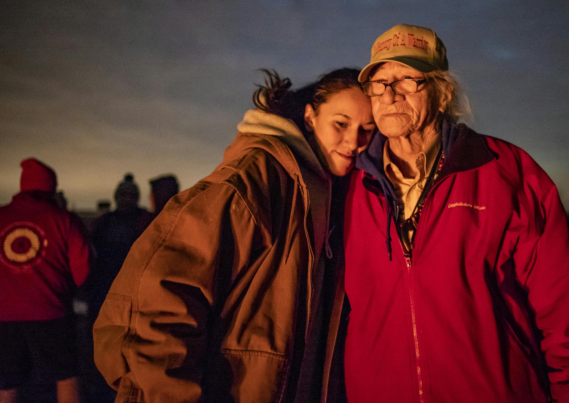 Anne White-Eastman, 35, hugged her father, Emmett Eastman, whose great-grandfather Little Thunder was one of the 38 hanged in Mankato following the U.S.-Dakota War.