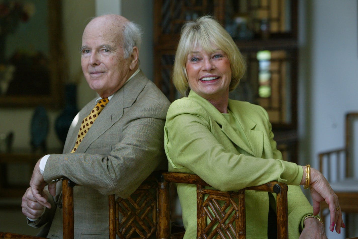 Deephaven MN. 6/5/2002--Bruce Dayton and Ruth Stricker (Dayton) interviewed recently by Mary Abbe about the extensive collection of Chinese art and artifacs they have given to the Minneapolis Arts Institute. They rest in century old chinese chairs that are common throughout the home. Ruth has mixed old with new with Chinese theme in every room. ORG XMIT: MIN2013121415270915