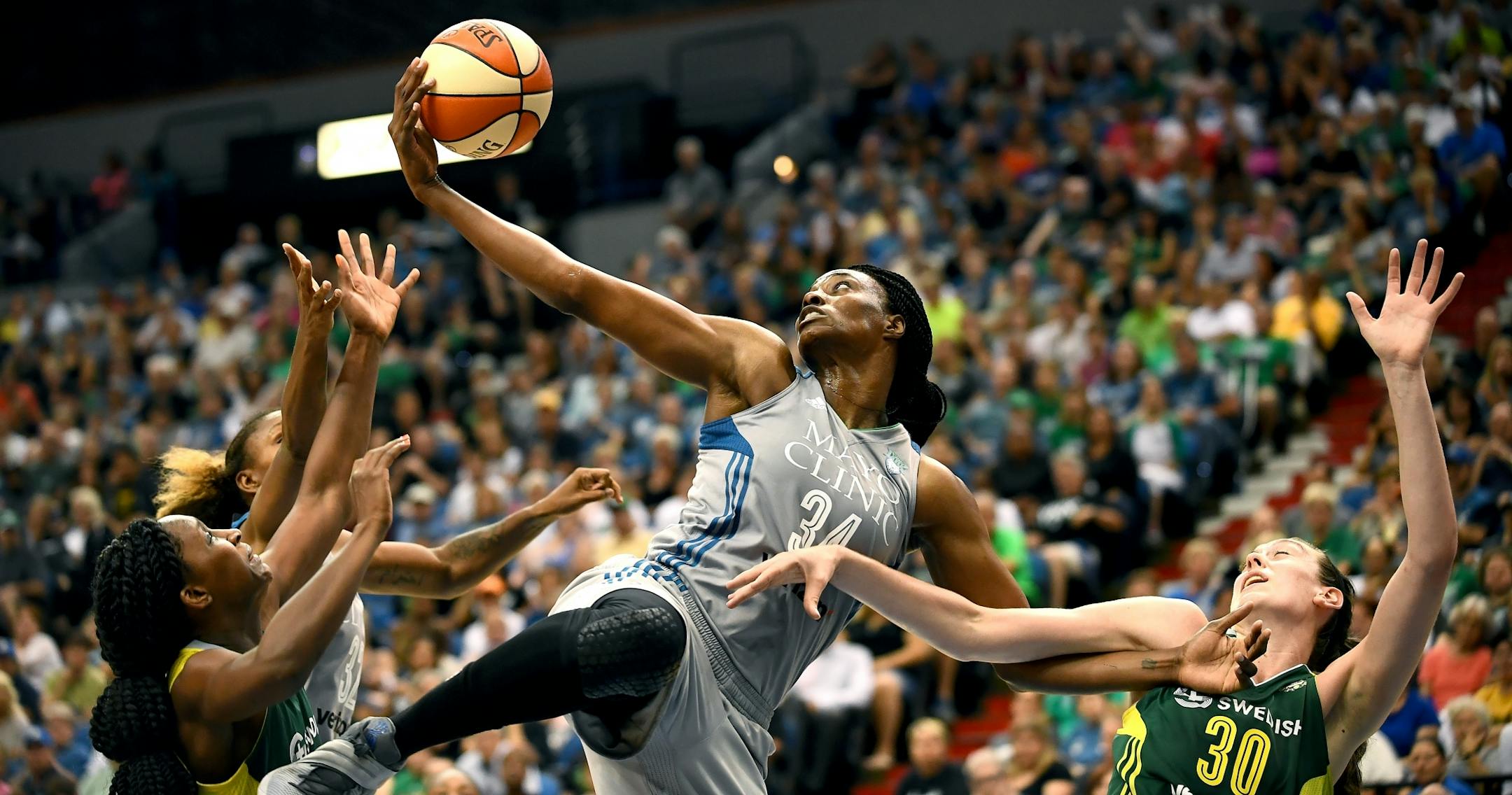 Minnesota Lynx center Sylvia Fowles (34) pulled down an offensive rebound in the fourth quarter Friday against the Seattle Storm.