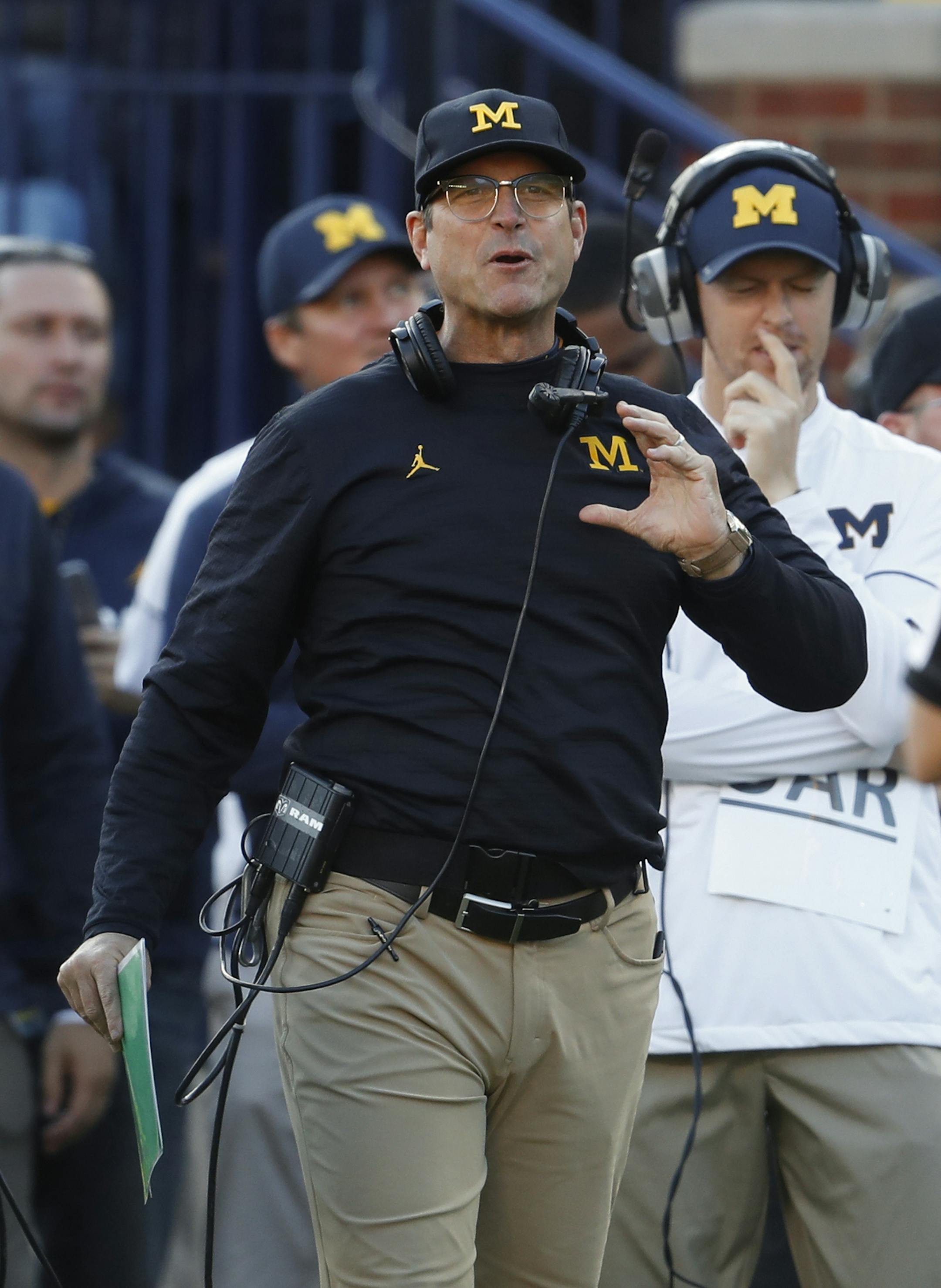 Michigan Wolverines head coach Jim Harbaugh watches against the Maryland Terrapins in the first half of an NCAA college football game in Ann Arbor, Mich., Saturday, Nov. 5, 2016. (AP Photo/Paul Sancya) ORG XMIT: AAS10 ORG XMIT: MIN1611241711401514