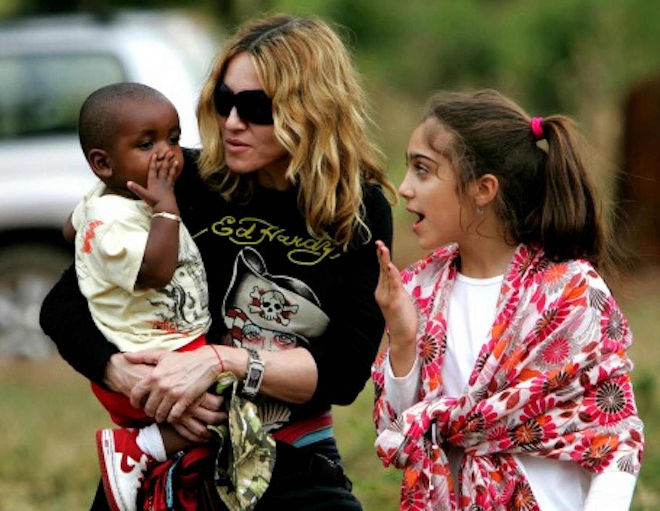 Madonna with kids David and budding fashionista Lola in 2008 AP file photo
