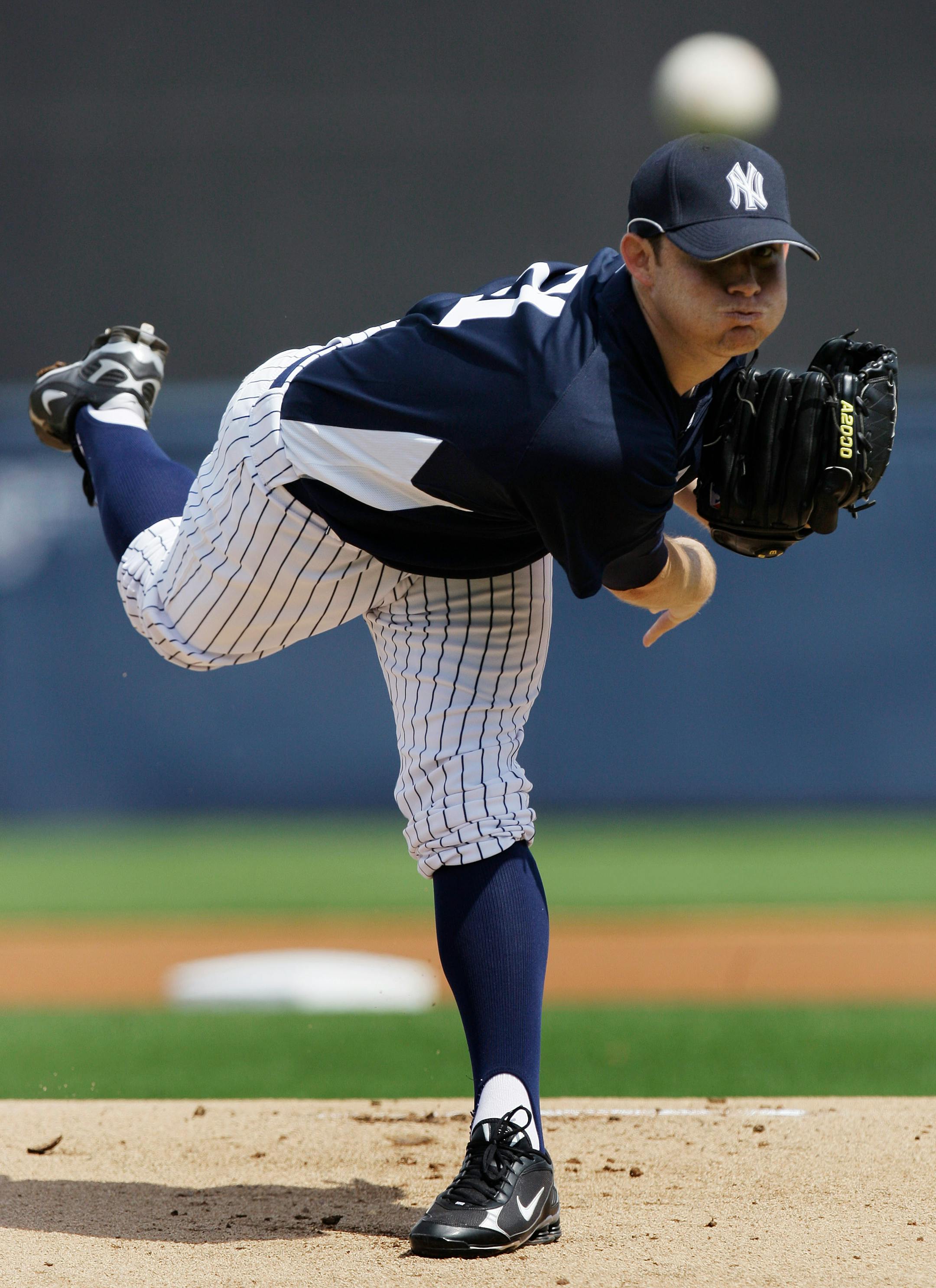 Ian Kennedy warmed up before Wednesday's game. He later gave up a homer to Delmon Young. "We're good friends," Kennedy said of Young. "I'll e-mail him tonight and say, 'You're welcome.' "
