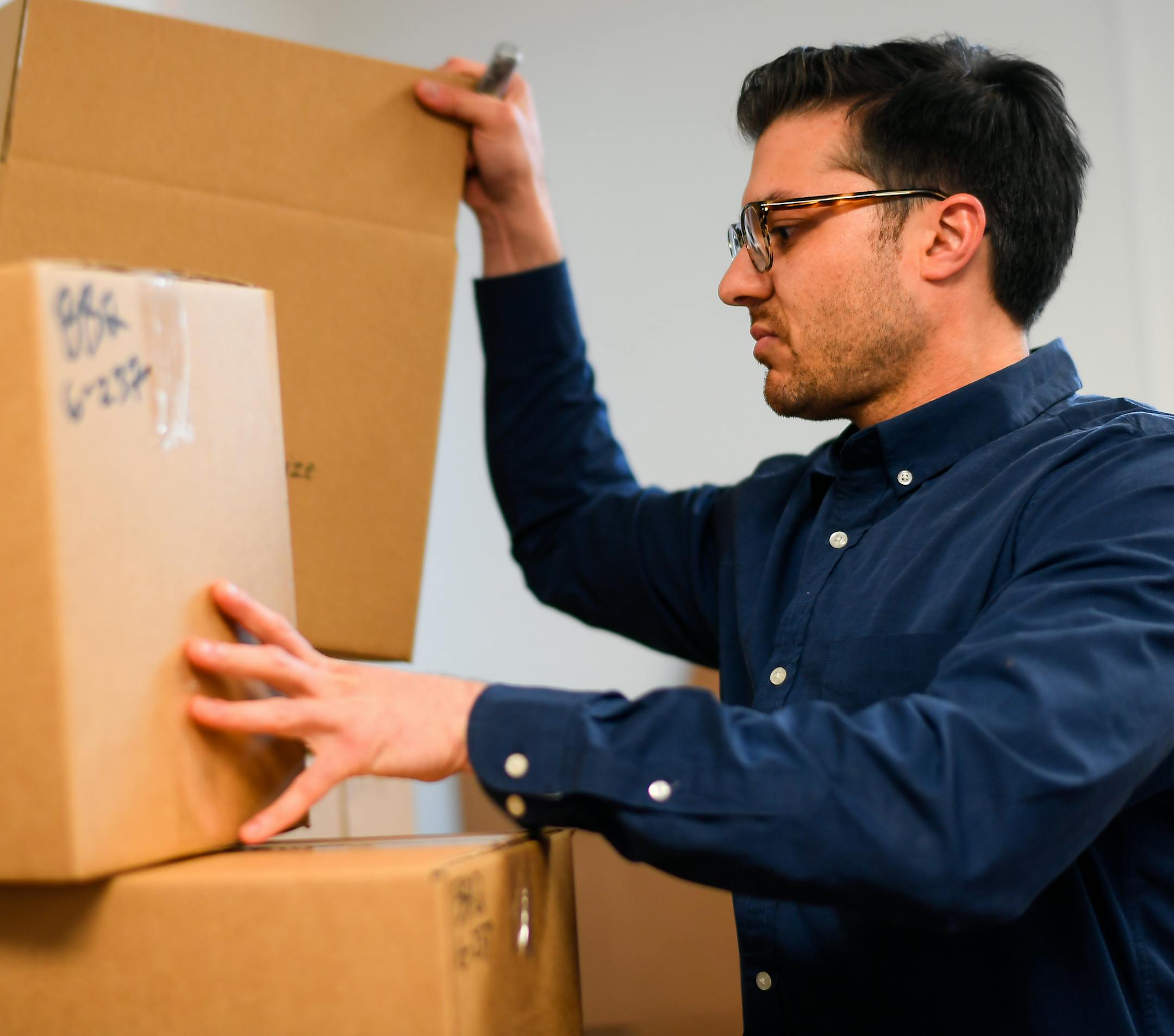 Maddy and Maize owner Brett Striker worked on boxing up his product Thursday. ] AARON LAVINSKY ï aaron.lavinsky@startribune.com Maddy and Maize, a Twin Cities-based gourmet popcorn company that started just a year ago has been featured at Target for the past 6 months. . The popcorn was featured in snack boxes at the Golden Globes and the Oscars. Unusual flavors is a key to its success. We photograph operations at Maddy and Maize and its owner, Brett Striker, on Thursday, March 22, 2018 in S