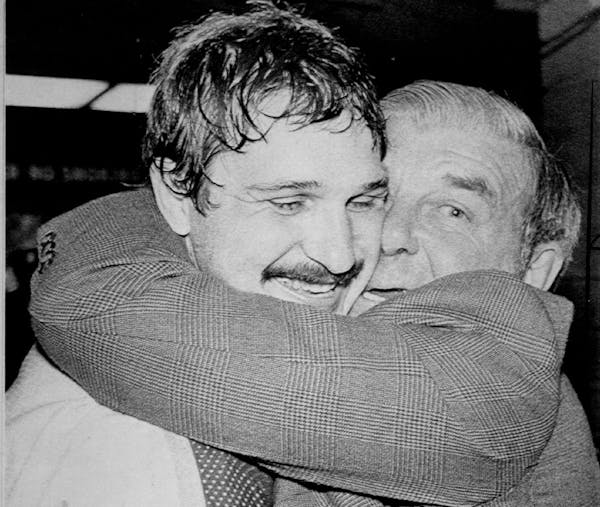 April 28, 1980 WINNING HUG---Minnesota North Stars goalie Gilles Meloche get a hug from North Stars scout Gump Worsley, a former Montreal Canadiens go