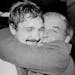 April 28, 1980 WINNING HUG---Minnesota North Stars goalie Gilles Meloche get a hug from North Stars scout Gump Worsley, a former Montreal Canadiens go