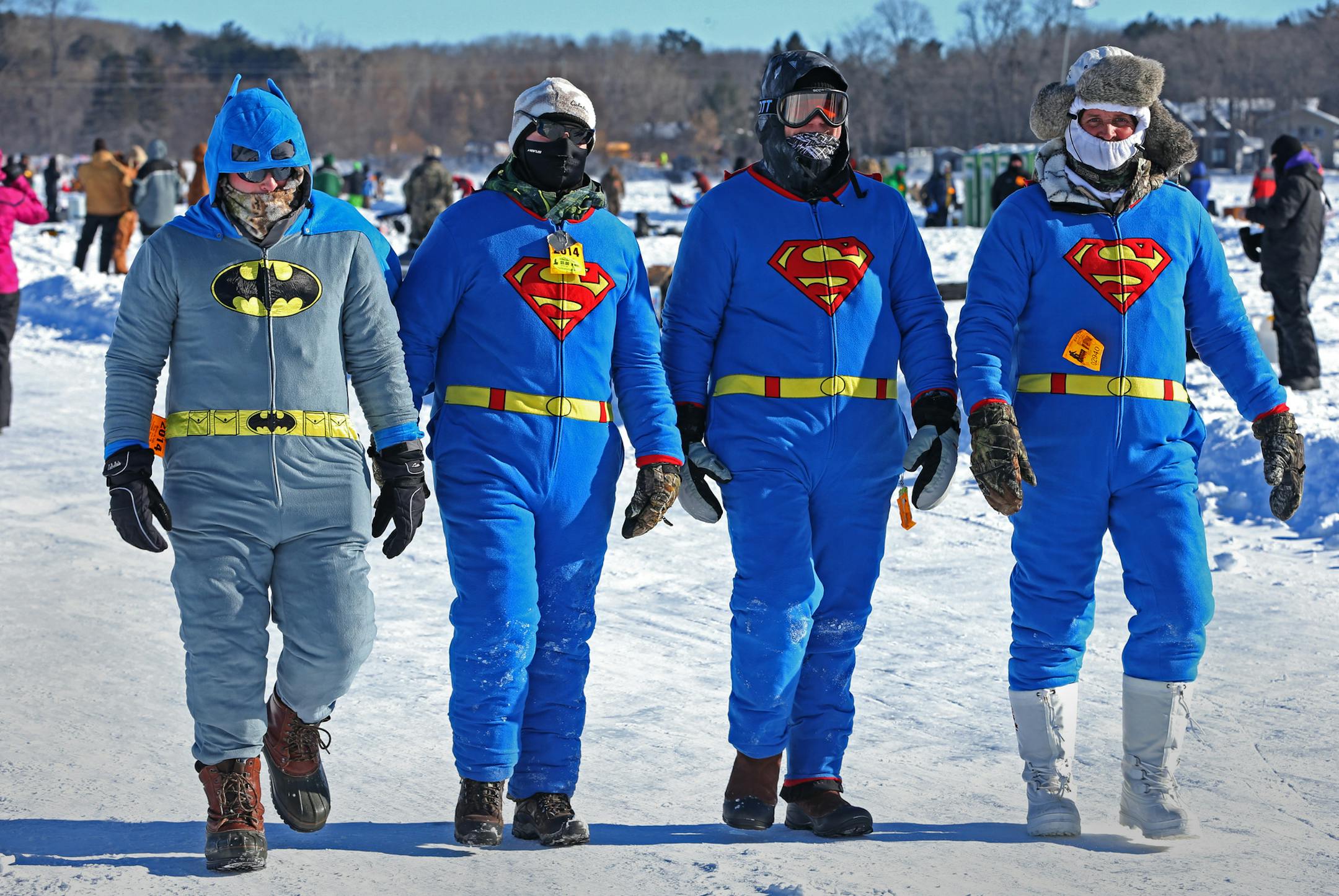 (left to right) Nick Schirra, Daniel Clayton, Patrick Hermann and Mike Clayton wore super hero suits as they walked to the fishing area on Gull Lake Hole in the Day Bay for the 24th annual Brainerd Jaycees $150,000 Ice Fishing Extravaganza. Over 10,000 fishermen competed for over $200,000 in prizes and all proceeds benefited area charities.] Bruce Bisping/Star Tribune bbisping@startribune.com Nick Schirra, Daniel Clayton, Patrick Hermann, Mike Clayton/source.