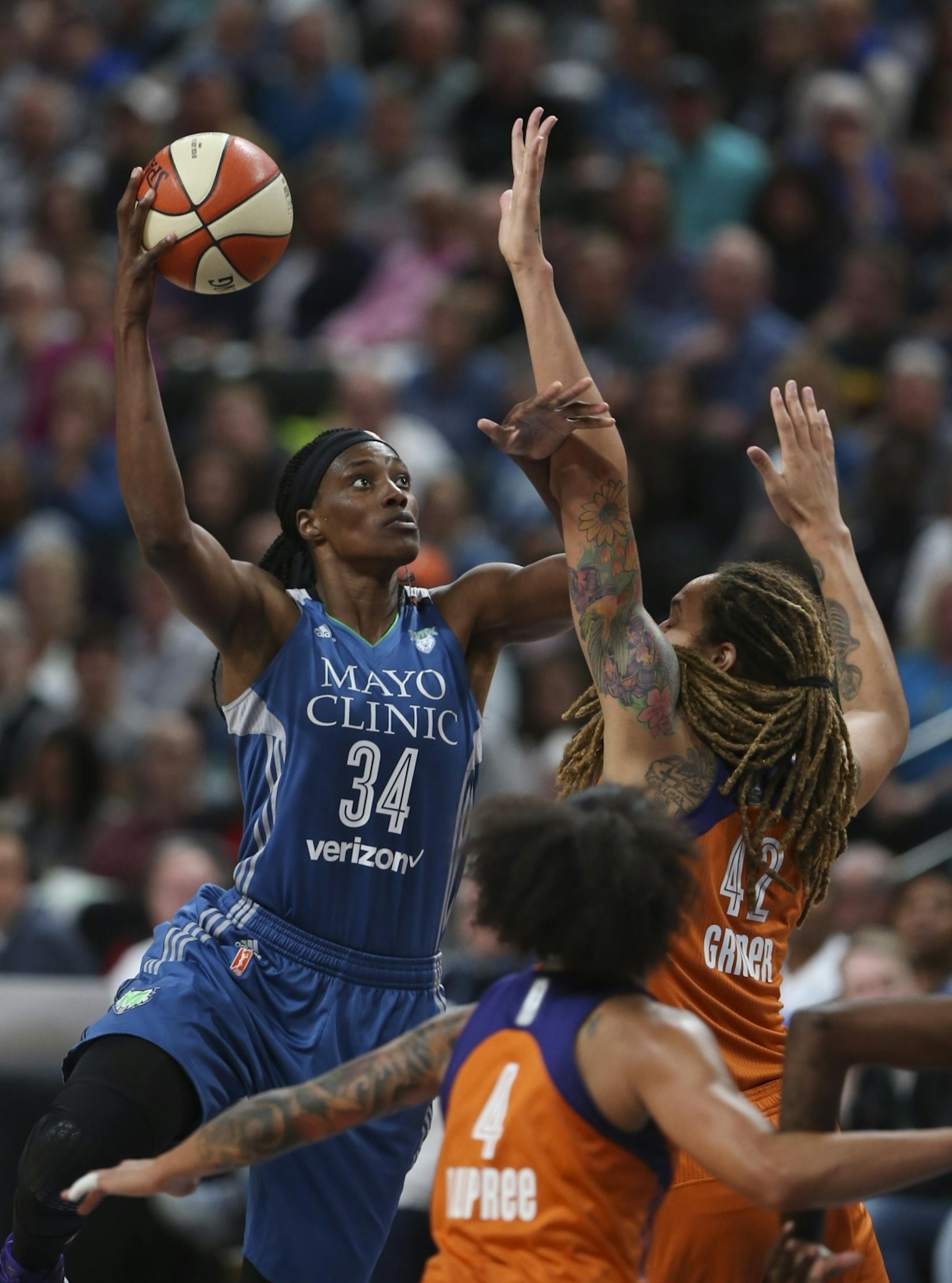 Minnesota Lynx center Sylvia Fowles (34) shot over the defense of Phoenix Mercury center Brittney Griner (42) in the fourth quarter.