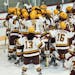 Minnesota Golden Gophers players celebrated on the ice after defeating the Princeton Tigers to advance to the Frozen Four at the end of the third peri