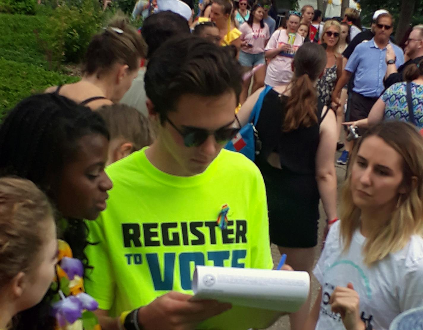 David Hogg, one of the students who survived the Stoneman Douglas High School shooting in Parkland, Fla., participates in a voter registration drive at the Twin Cities Pride Parade on June 24, 2018 in Minneapolis.