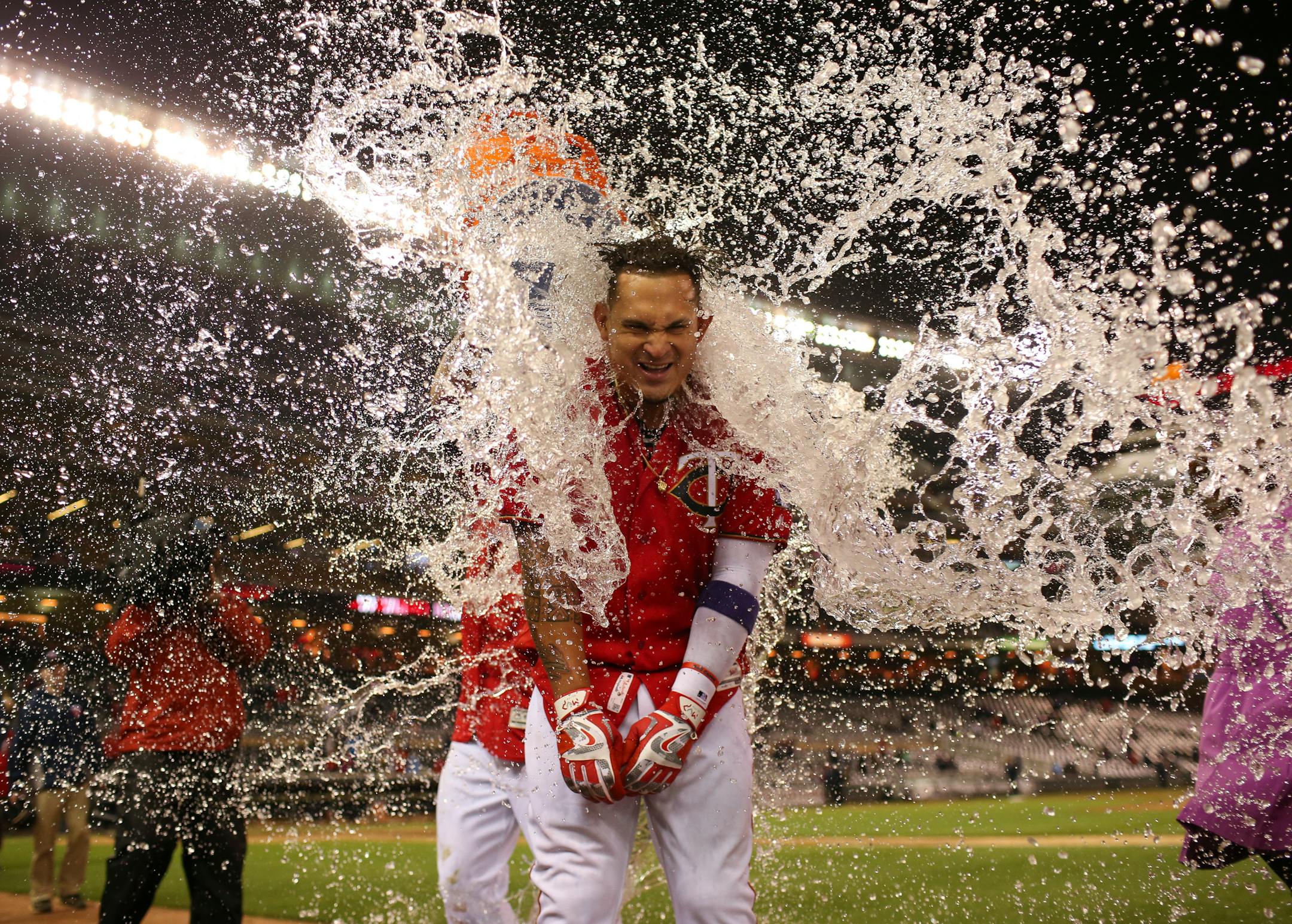 The Twins' Oswaldo Arcia received a Gatorade shower just before a postgame interview after his walk-off home run in the ninth inning beat Cleveland 4-3 Monday night.