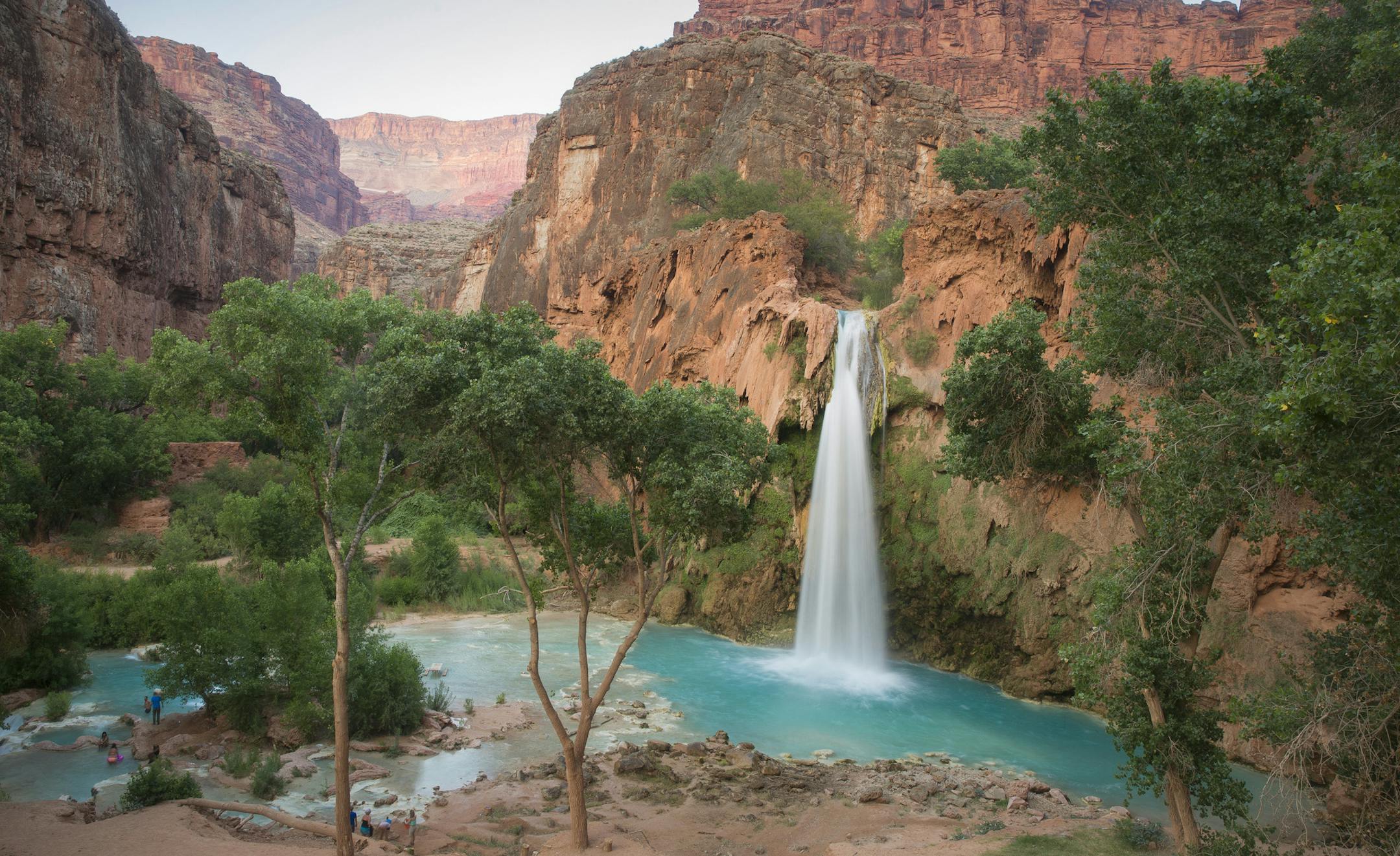 Havasu Falls on Havasupai Reservation in Arizona, April 19, 2015. At the bottom of a narrow gorge near the southwest corner of the Grand Canyon National Park, are the Havasu Falls, which spill 90 feet over red rocks into beautiful incandescent pools. (John Burcham/The New York Times) ORG XMIT: XNYT64